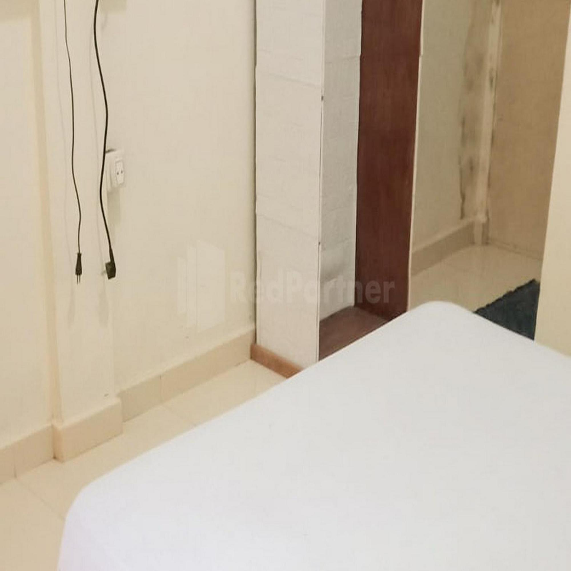טאנג'ונג פינאנג Wisma Pinggir Mitra Reddoorz מראה חיצוני תמונה